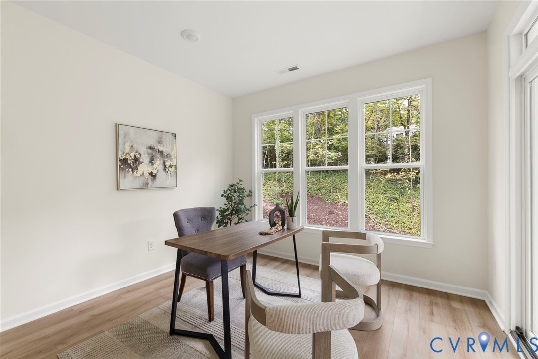 4236 Shirley Road Richmond, VA 23225 - Photo 21 of 40 a workspace room with furniture and a window