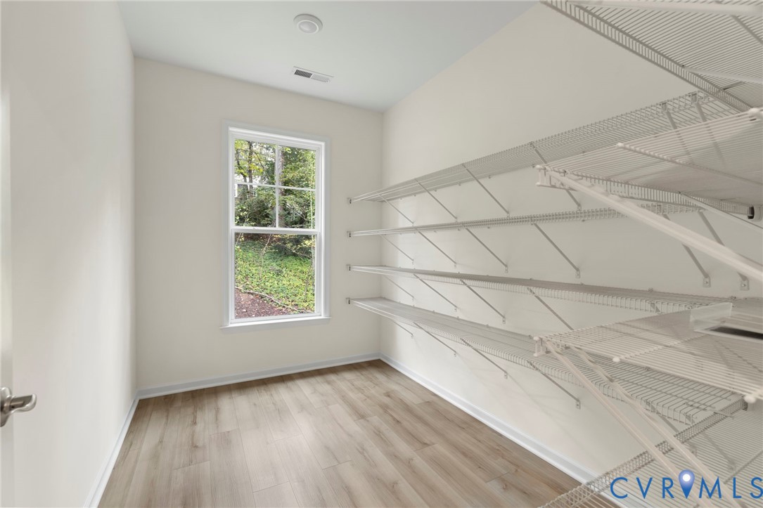 4236 Shirley Road Richmond, VA 23225 - Photo 26 of 40 a view of an empty room with a window