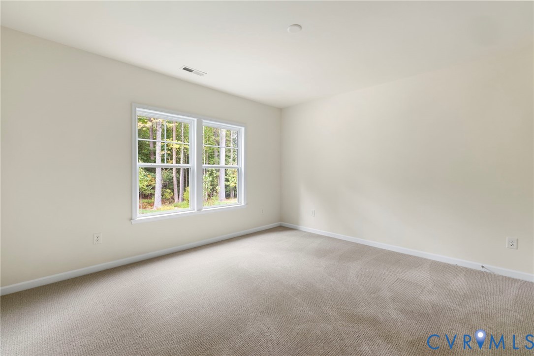 4236 Shirley Road Richmond, VA 23225 - Photo 35 of 40 an empty room with a window