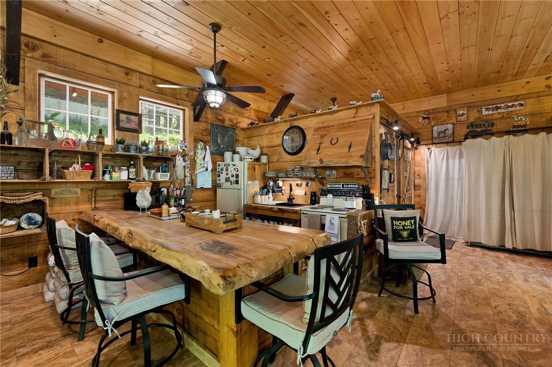 165 Natures Way Boone, NC 28607 - Photo 25 of 50 a view of a chairs and table in a patio