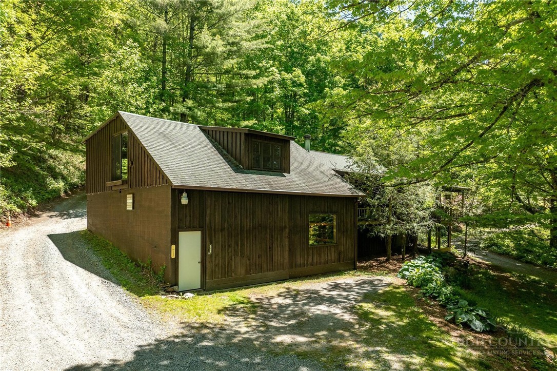 165 Natures Way Boone, NC 28607 - Photo 3 of 50 a front view of a house with a yard