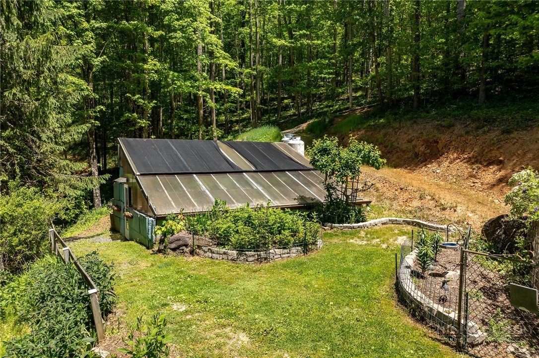 165 Natures Way Boone, NC 28607 - Photo 32 of 50 a view of a backyard with plants