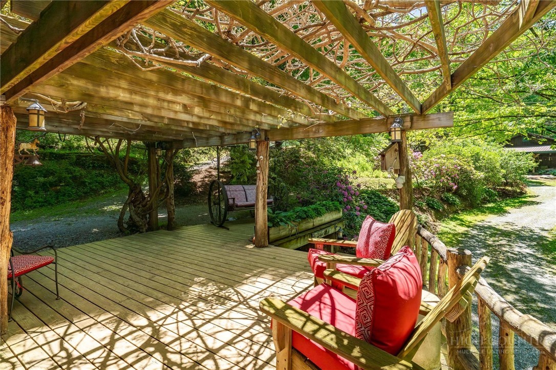 165 Natures Way Boone, NC 28607 - Photo 49 of 50 a backyard of a house with yard and outdoor seating