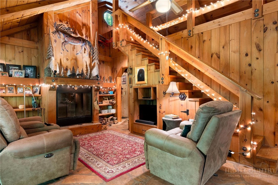 165 Natures Way Boone, NC 28607 - Photo 7 of 50 a living room with furniture and a fireplace