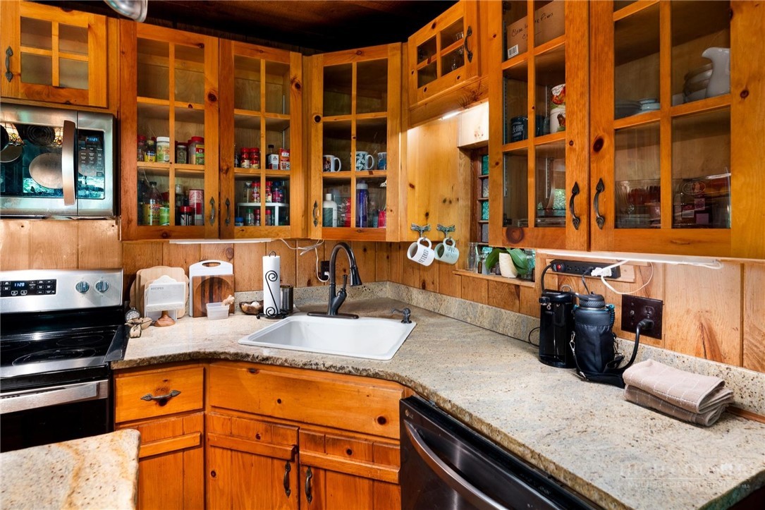 165 Natures Way Boone, NC 28607 - Photo 10 of 50 a kitchen with a sink and a counter top space