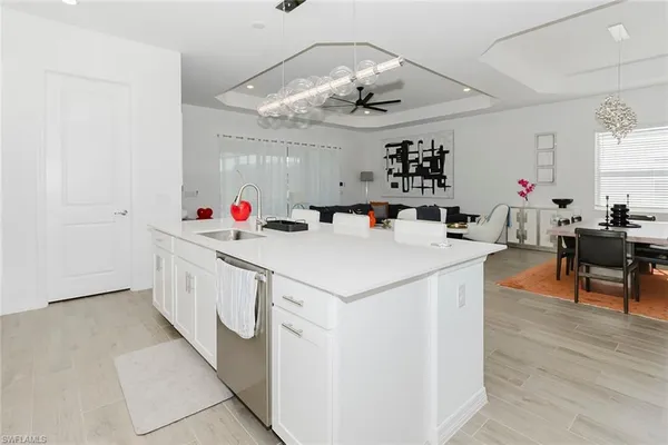 a kitchen with a sink and cabinets