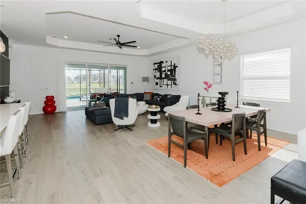 a view of a dining room with furniture window and outside view