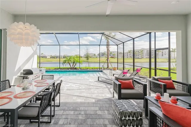 a room with musical instrument pool table and chairs