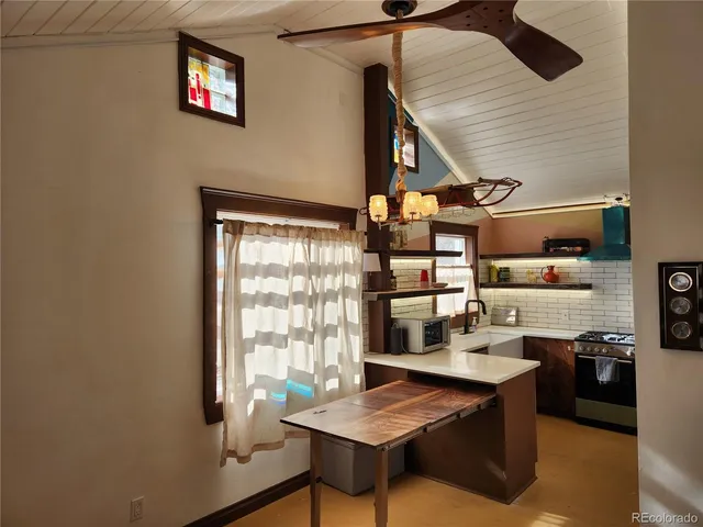 a room with furniture and window