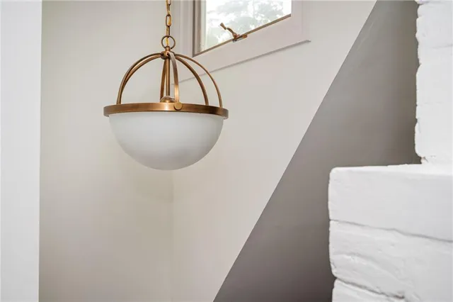 a spacious bathroom with a tub double sink window and mirror