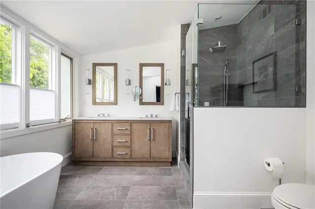 a view of roof deck with patio