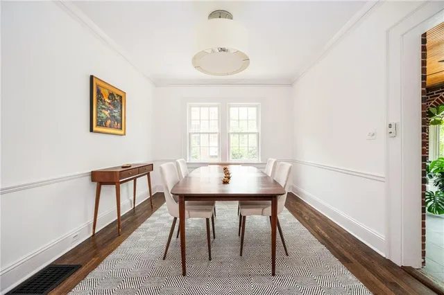 a kitchen with a refrigerator and window