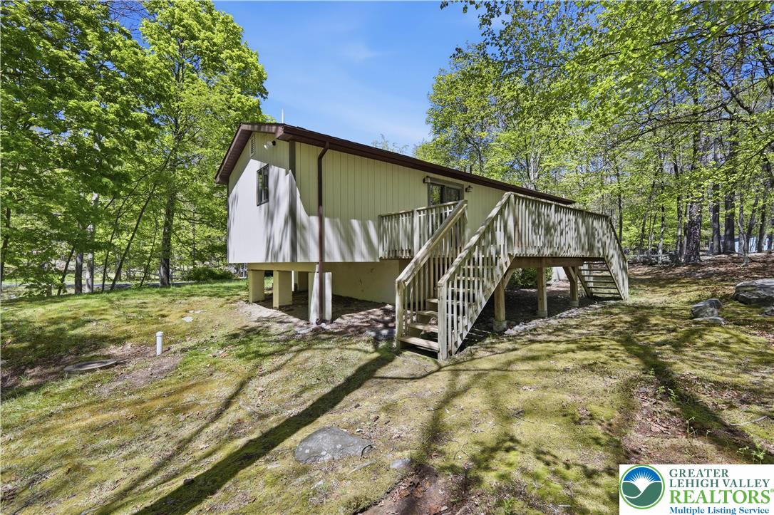 505 Chipmunk Road Bushkill, PA 18324 - Photo 34 of 46 a view of wooden house with a yard