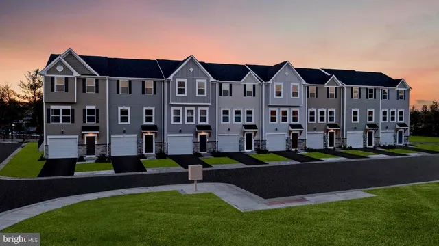 a view of big yard in front of big yard and road