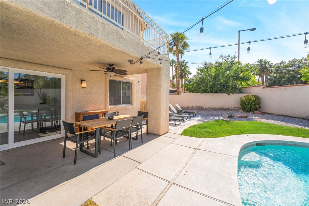 1941 Ivy Point Lane Las Vegas, NV 89134 - Photo 21 of 21 This private outdoor retreat features a covered patio, refreshing pool, and inviting lounge area for seamless relaxation.