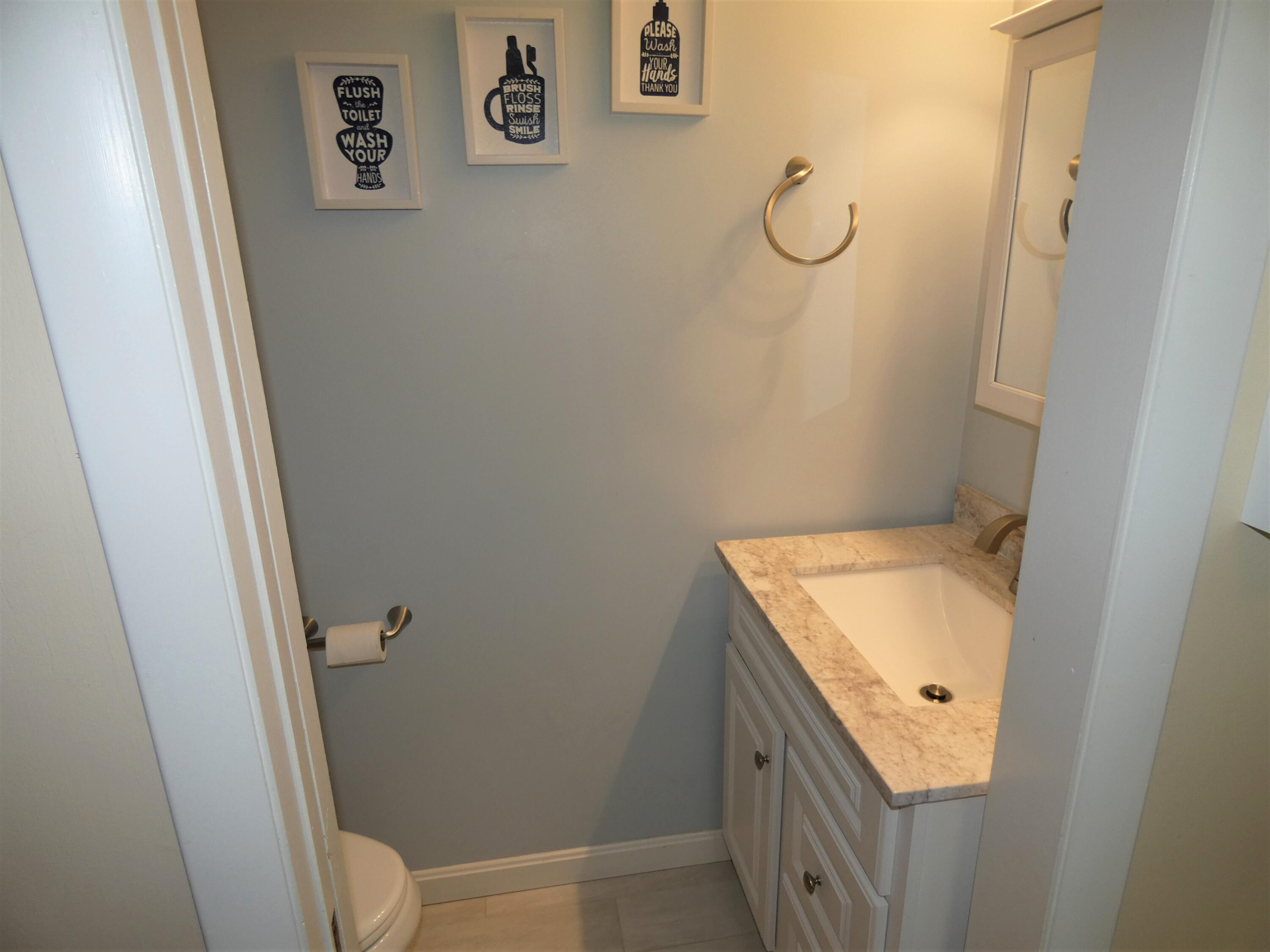 17 Graham Road, Unit 1 Westbrook, ME 04092 - Photo 20 of 33 1st Floor Powder Room