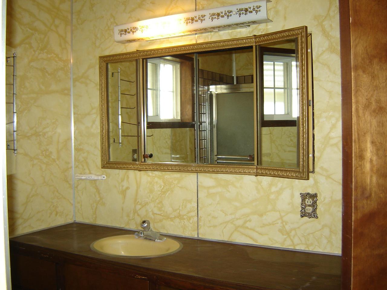 2411 Duffield Road Moxee, WA 98936 - Photo 8 of 13 a bathroom with a sink and a mirror