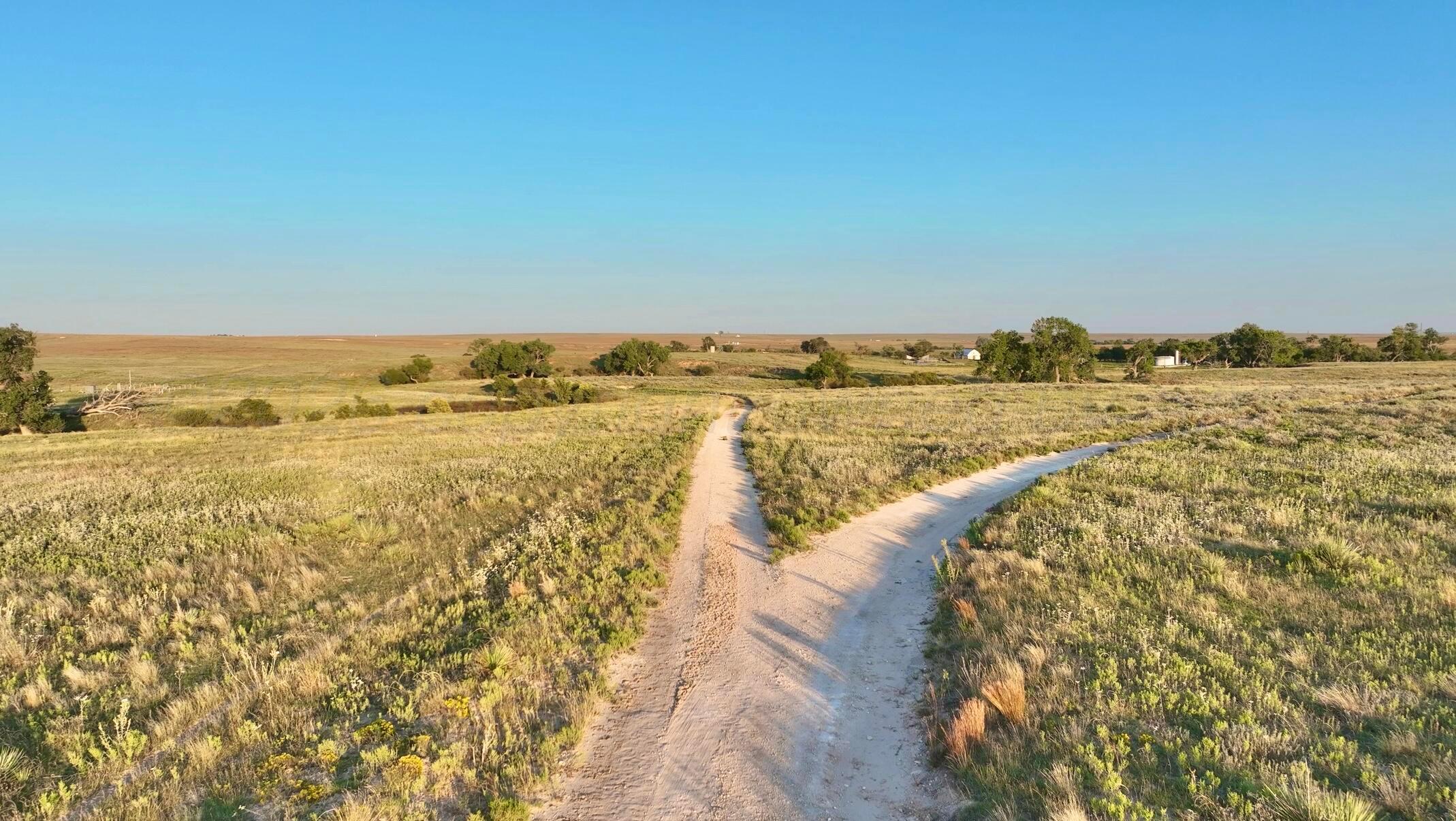 First Creek Ranch Booker, TX 79005 - Photo 23 of 25 a view of an ocean and beach