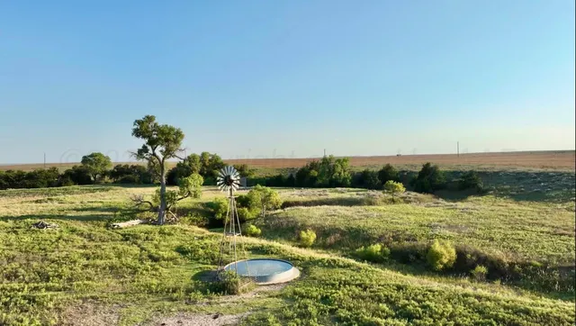 a view of a lake with beach