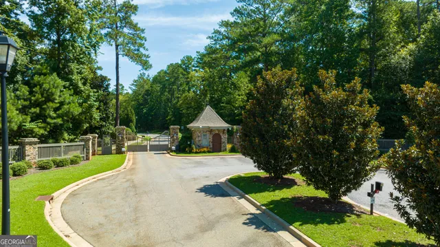 swimming pool view with a seating space