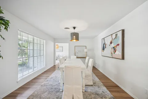 a living room with furniture and a gate