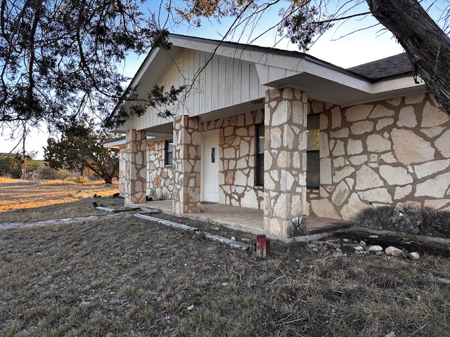 810 Kc 271 Junction Junction, TX 76849 - Photo 2 of 20 View of home's exterior with stone siding