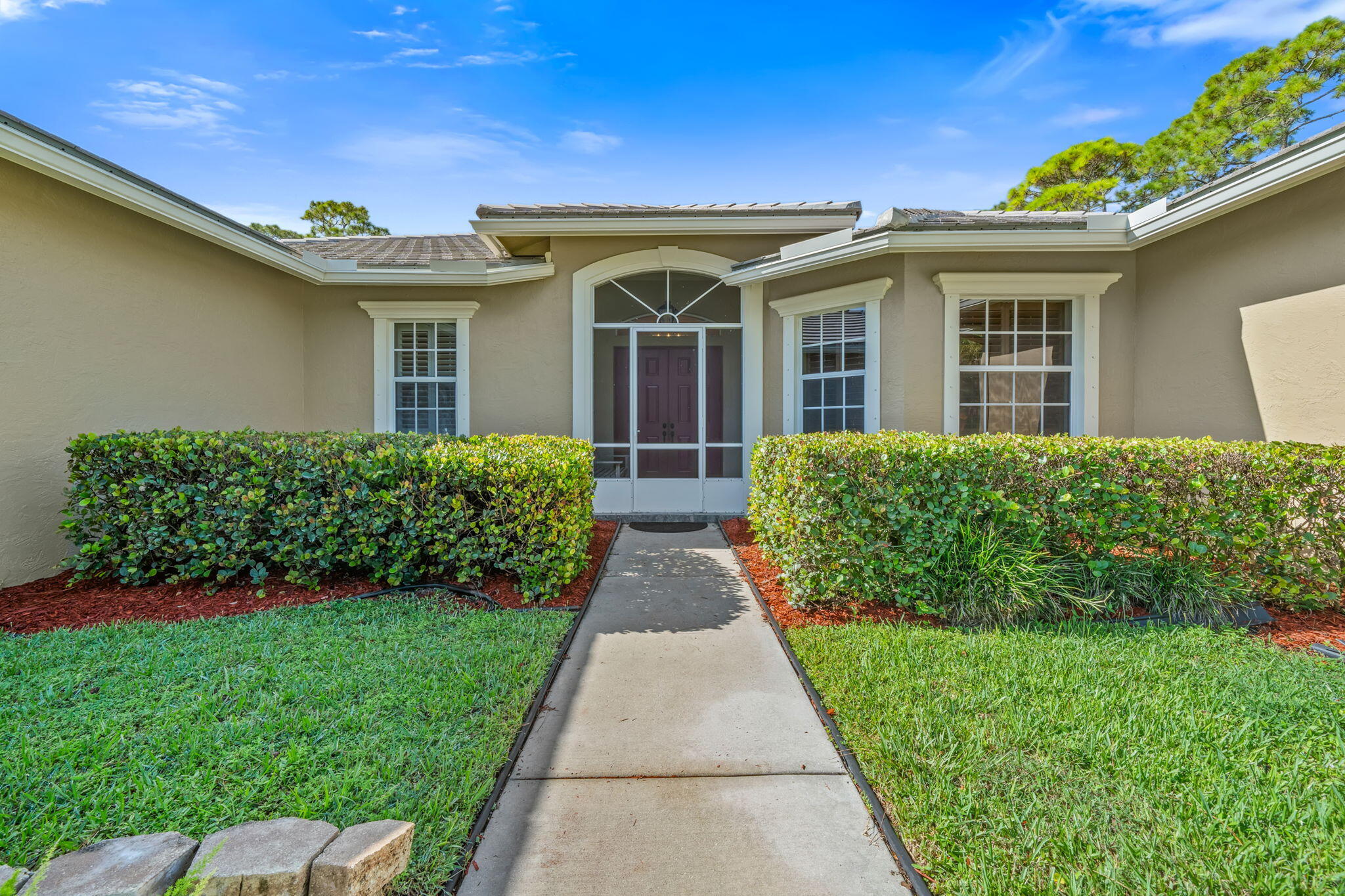 8732 Rodeo Drive Lake Worth, FL 33467 - Photo 4 of 41 Leading to front door