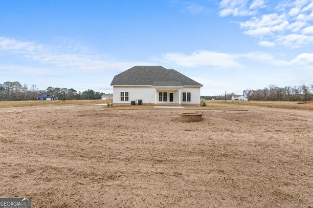 a house with river in front of it