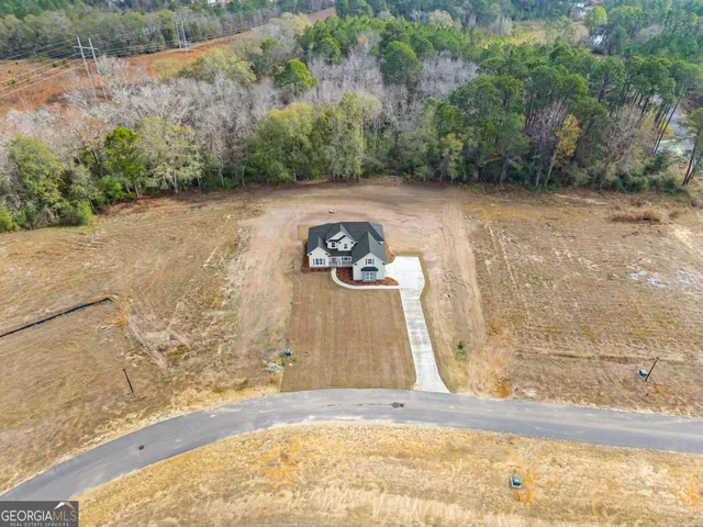 a view of a wooden floor with a yard