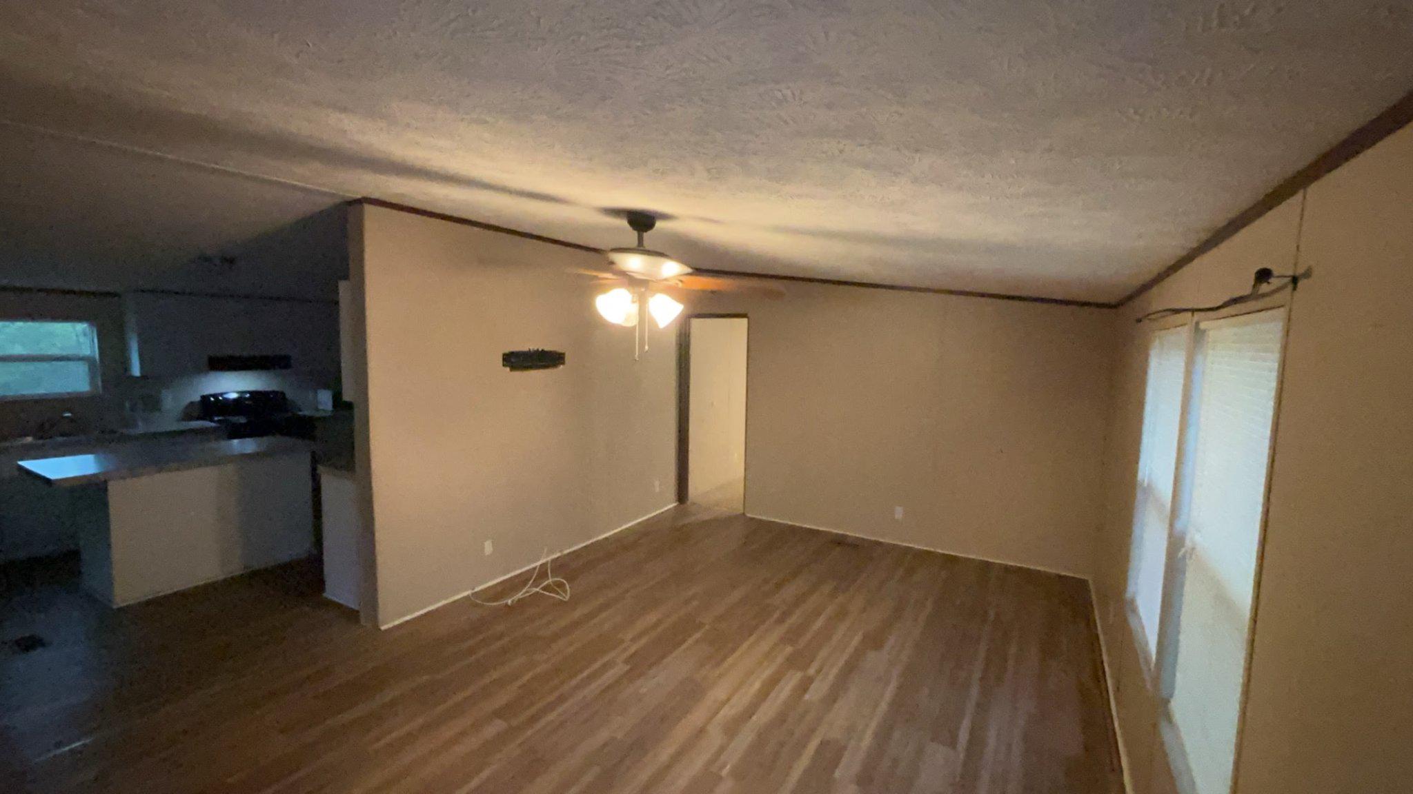 8510 Darcy Lane Partlow, VA 22534 - Photo 8 of 27 a view of empty room with wooden floor
