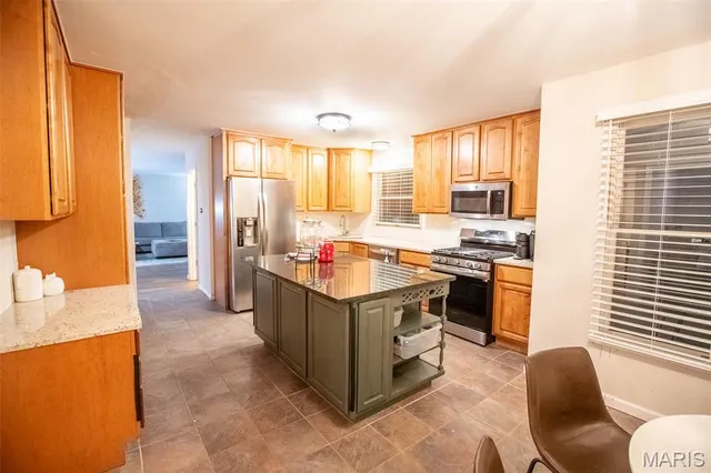 $455,000 | 260 Monroe Mill Drive, Ballwin, MO 63011