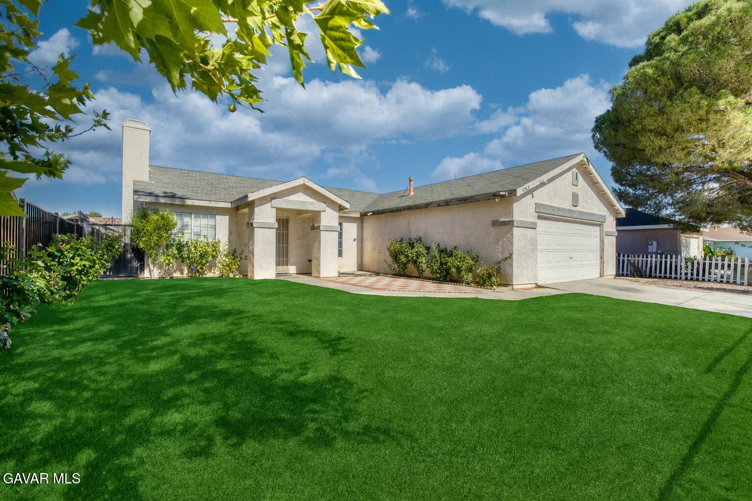 a view of outdoor space yard and front view of a house