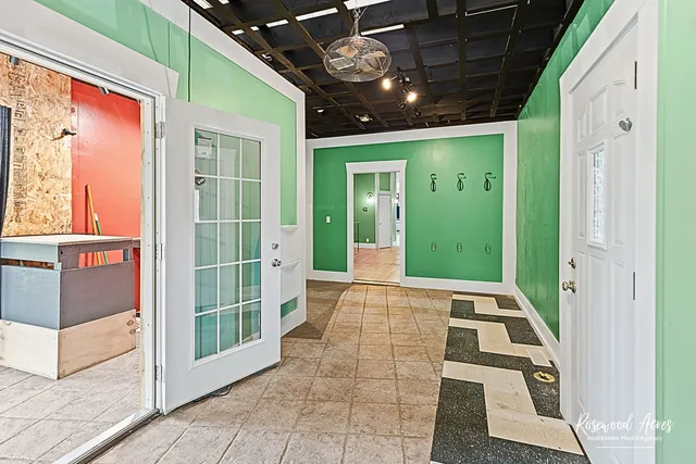 a spacious bathroom with a shower and a tub