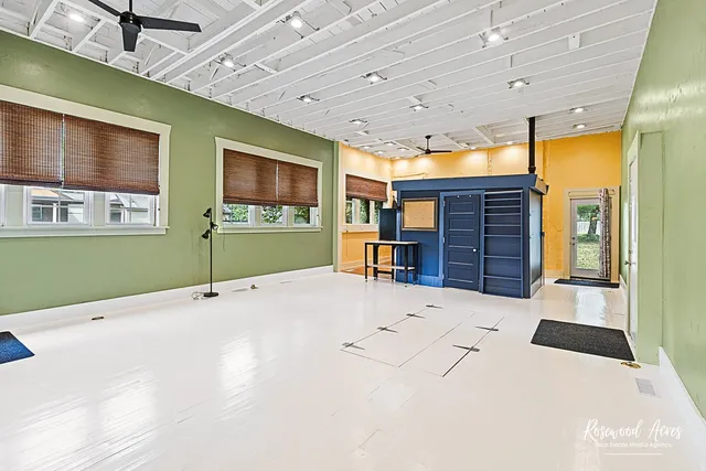 a bathroom with a double vanity sink and mirror