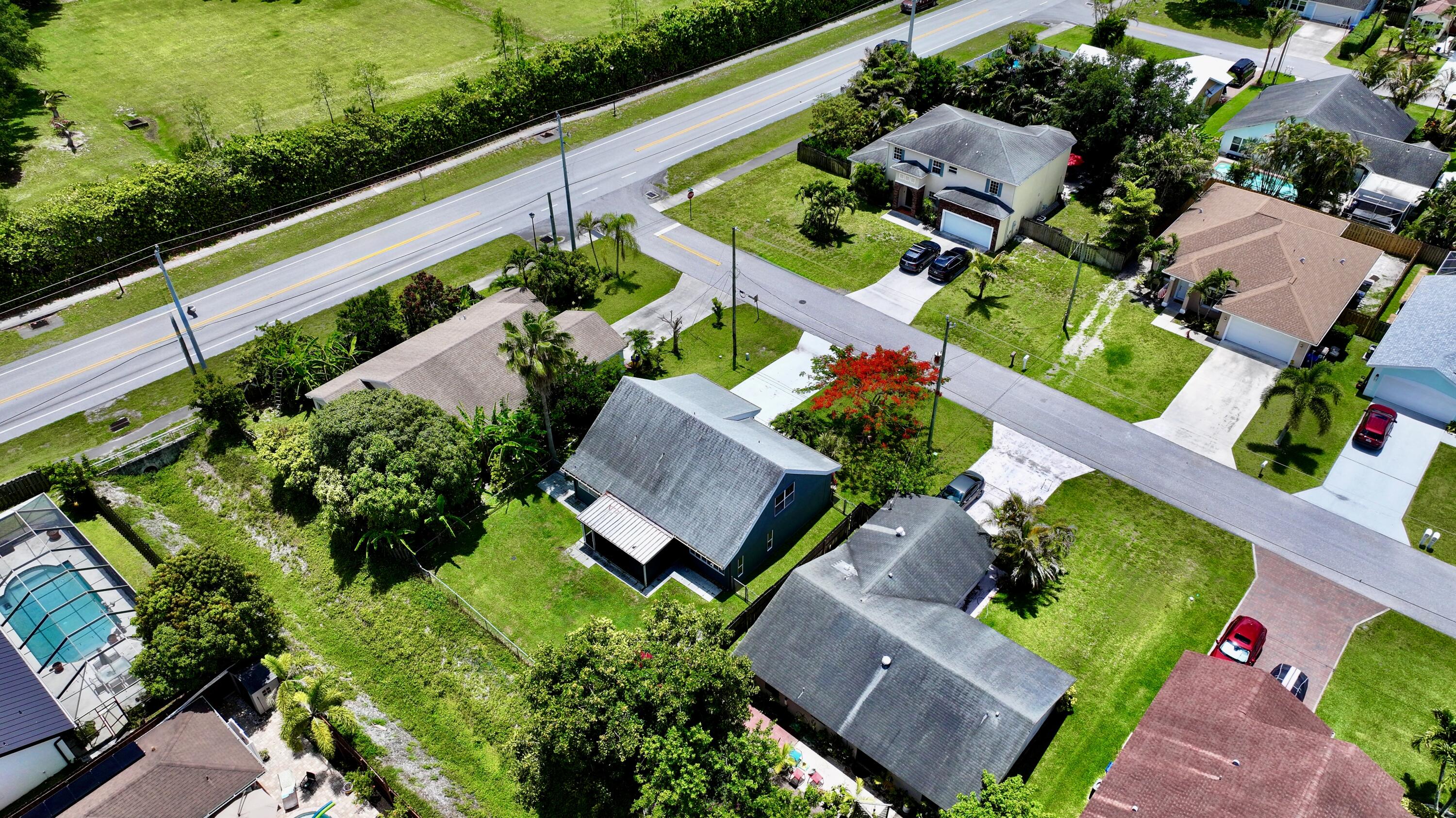 6048 Garrett Street Jupiter, FL 33458 - Photo 88 of 101 dji_fly_20260522_125016_0946_17794718999