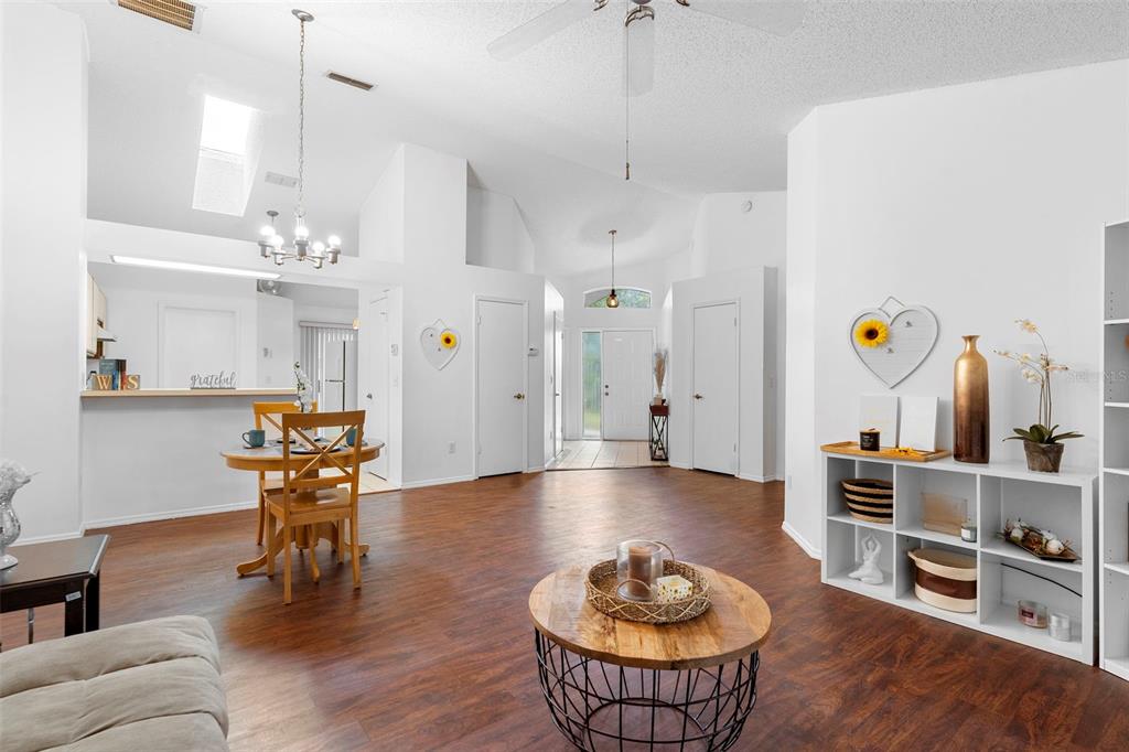 13103 Edberg Court Orlando, FL 32824 - Photo 15 of 42 a room with furniture and view of kitchen