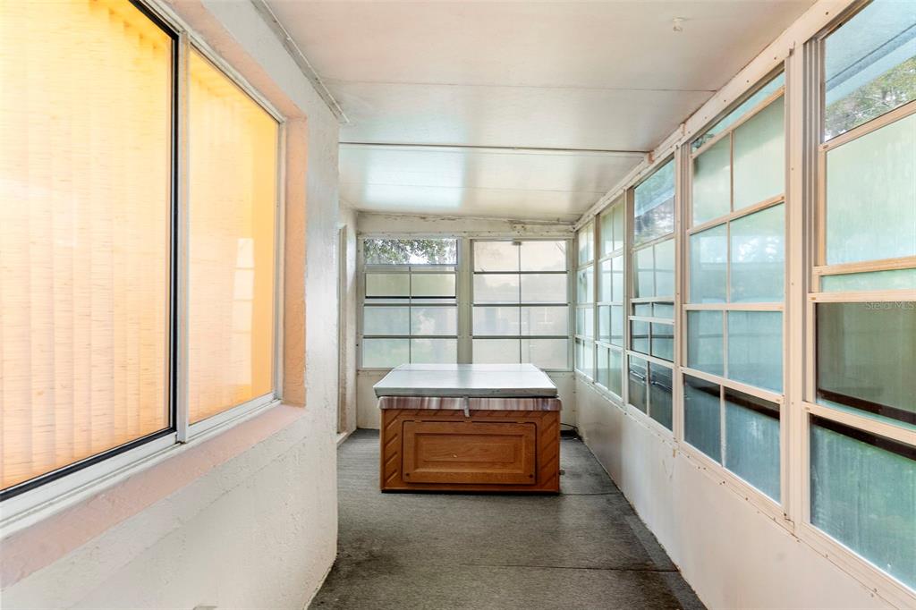 13103 Edberg Court Orlando, FL 32824 - Photo 36 of 42 a room with a bed and glass window