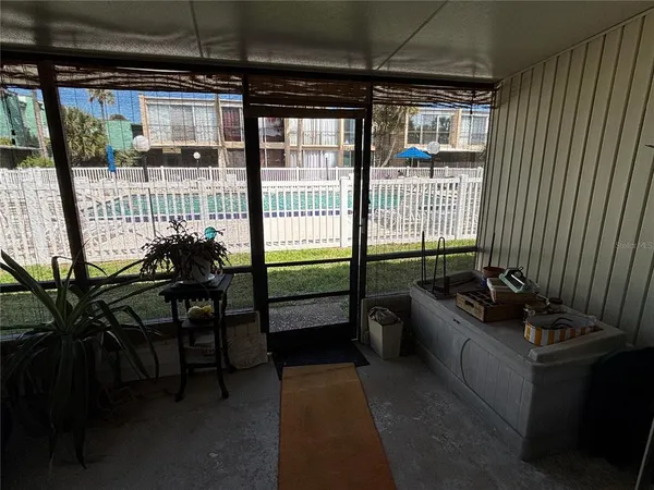 a view of a porch with chairs