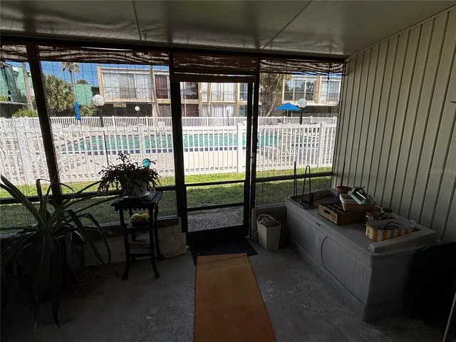 a view of a porch with chairs