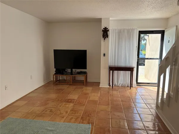 a kitchen with a sink cabinets and stainless steel appliances