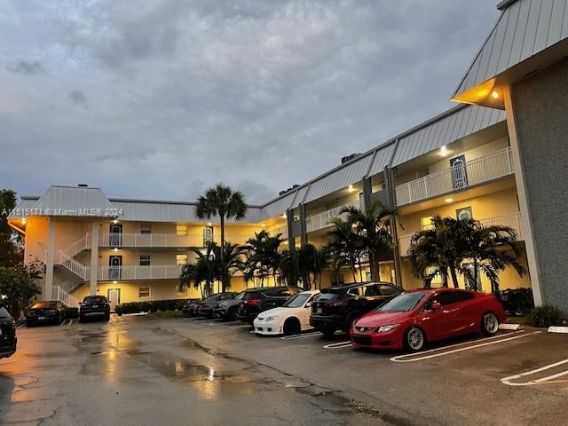 2960 Riverside Drive, Unit 3192 Coral Springs, FL 33065 - Photo 12 of 12 a view of a cars parked in a parking lot