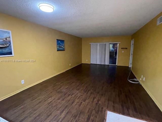 2960 Riverside Drive, Unit 3192 Coral Springs, FL 33065 - Photo 2 of 12 a view of a livingroom with wooden floor