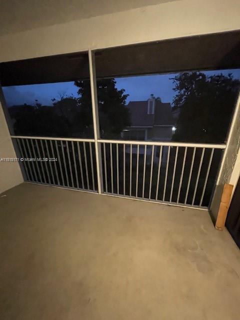 2960 Riverside Drive, Unit 3192 Coral Springs, FL 33065 - Photo 9 of 12 a view of balcony with wooden floor