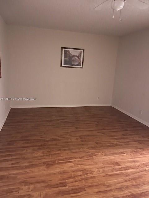 2960 Riverside Drive, Unit 3192 Coral Springs, FL 33065 - Photo 10 of 12 a view of room with wooden floor