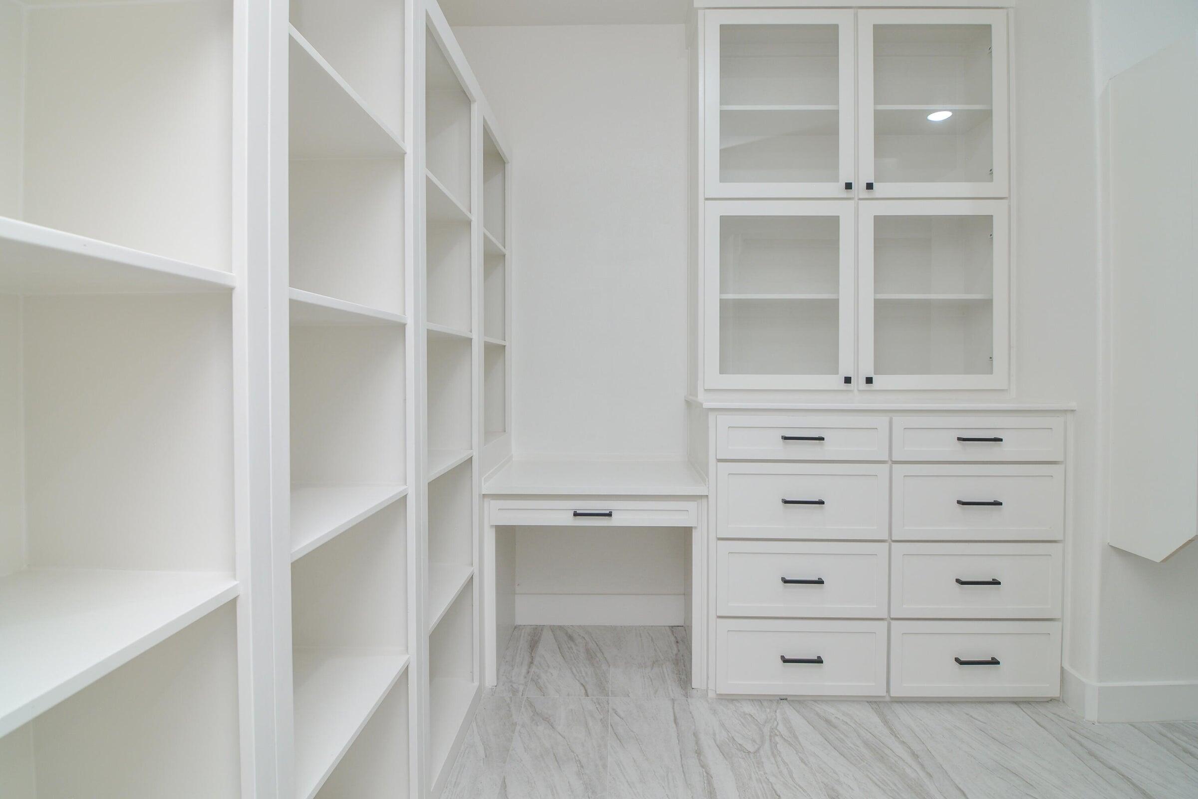7801 56th Street Lubbock, TX 79407 - Photo 15 of 29 a view of an empty walk in closet