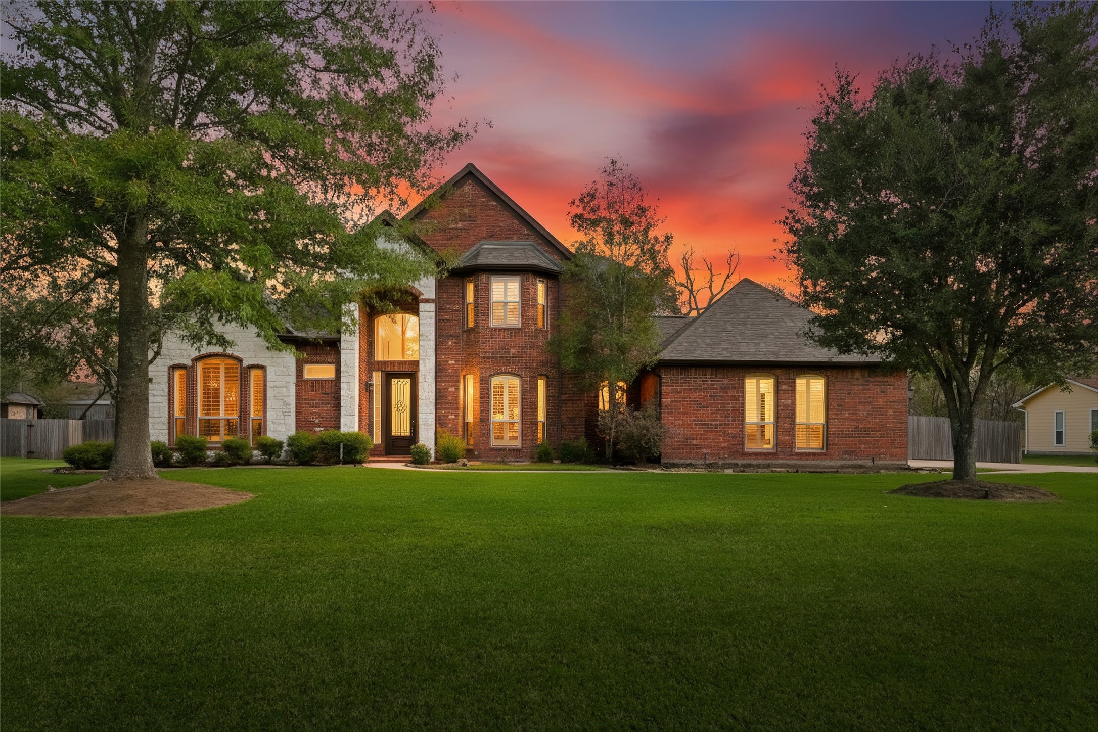 3602 River Bend Drive Rosenberg, TX 77471 - Photo 1 of 49 a front view of a house with a yard