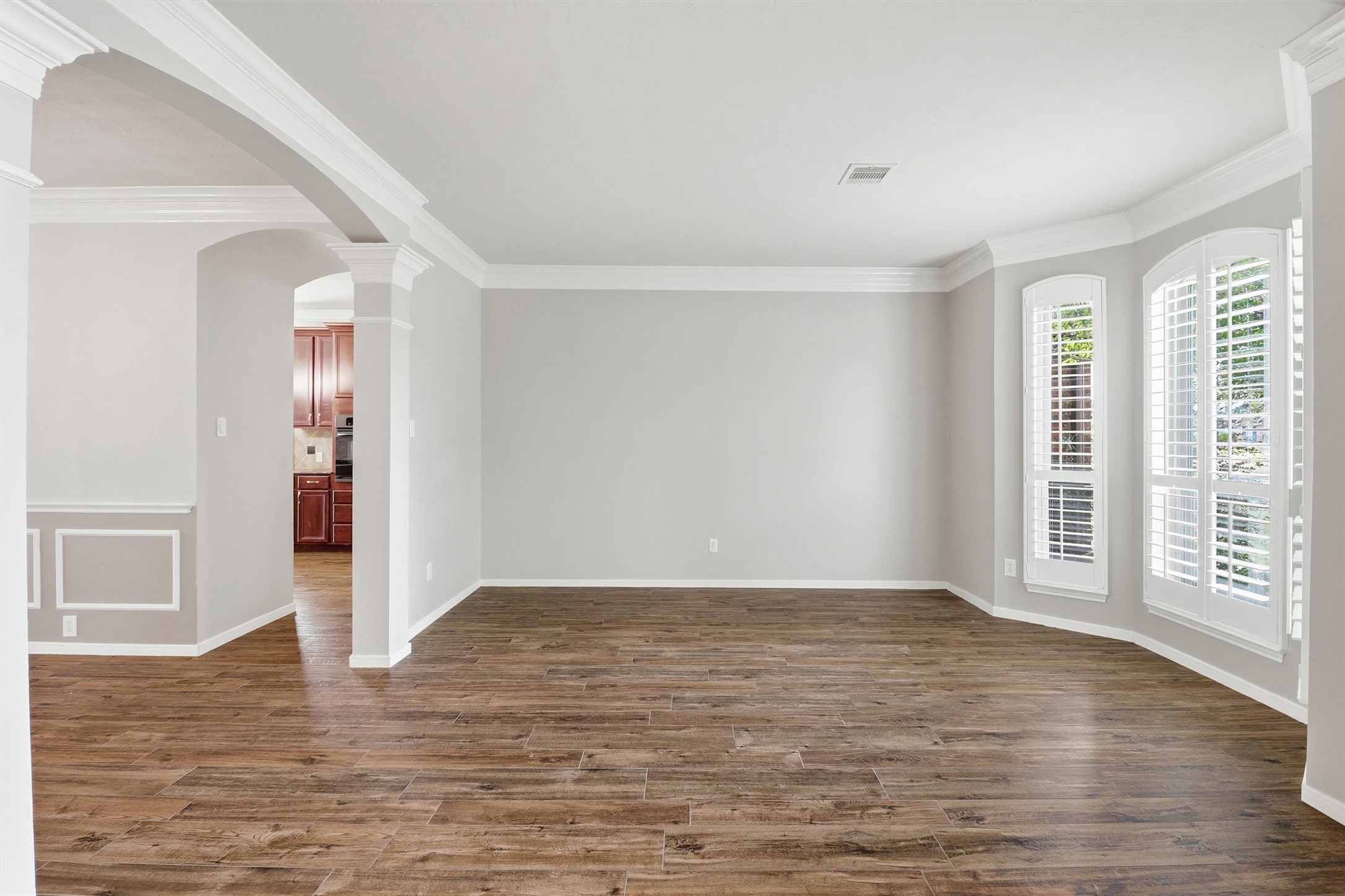3602 River Bend Drive Rosenberg, TX 77471 - Photo 12 of 49 wooden floor in an empty room with a window
