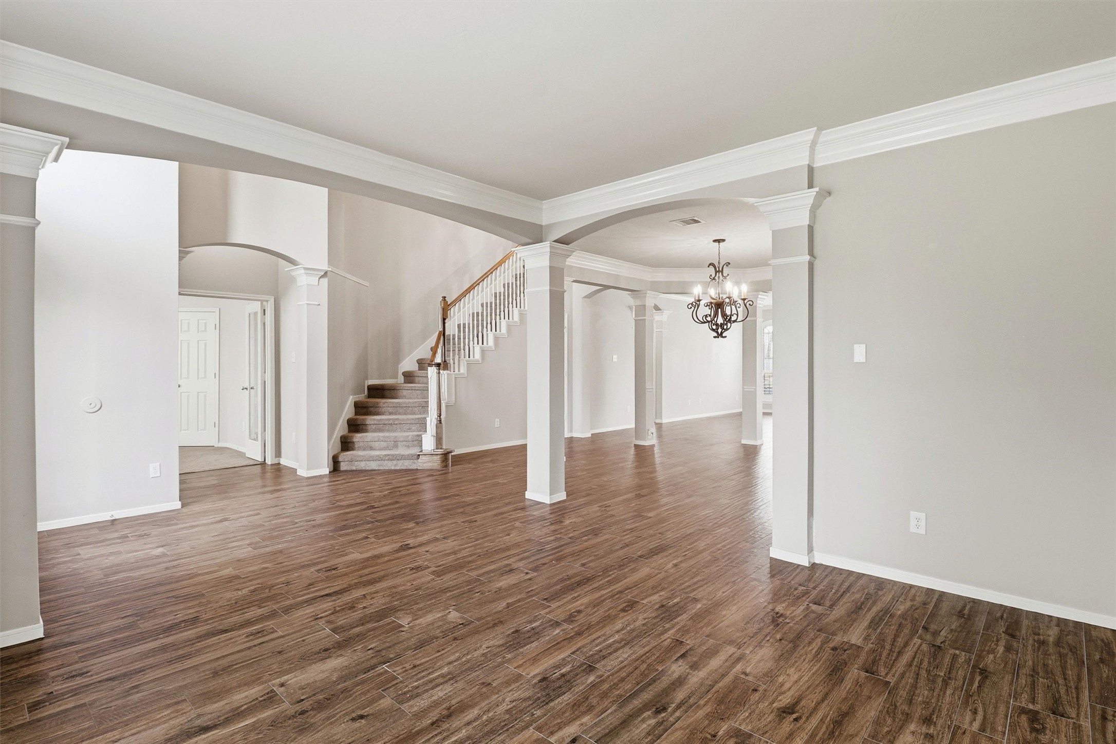 3602 River Bend Drive Rosenberg, TX 77471 - Photo 14 of 49 a view of a hallway with wooden floor