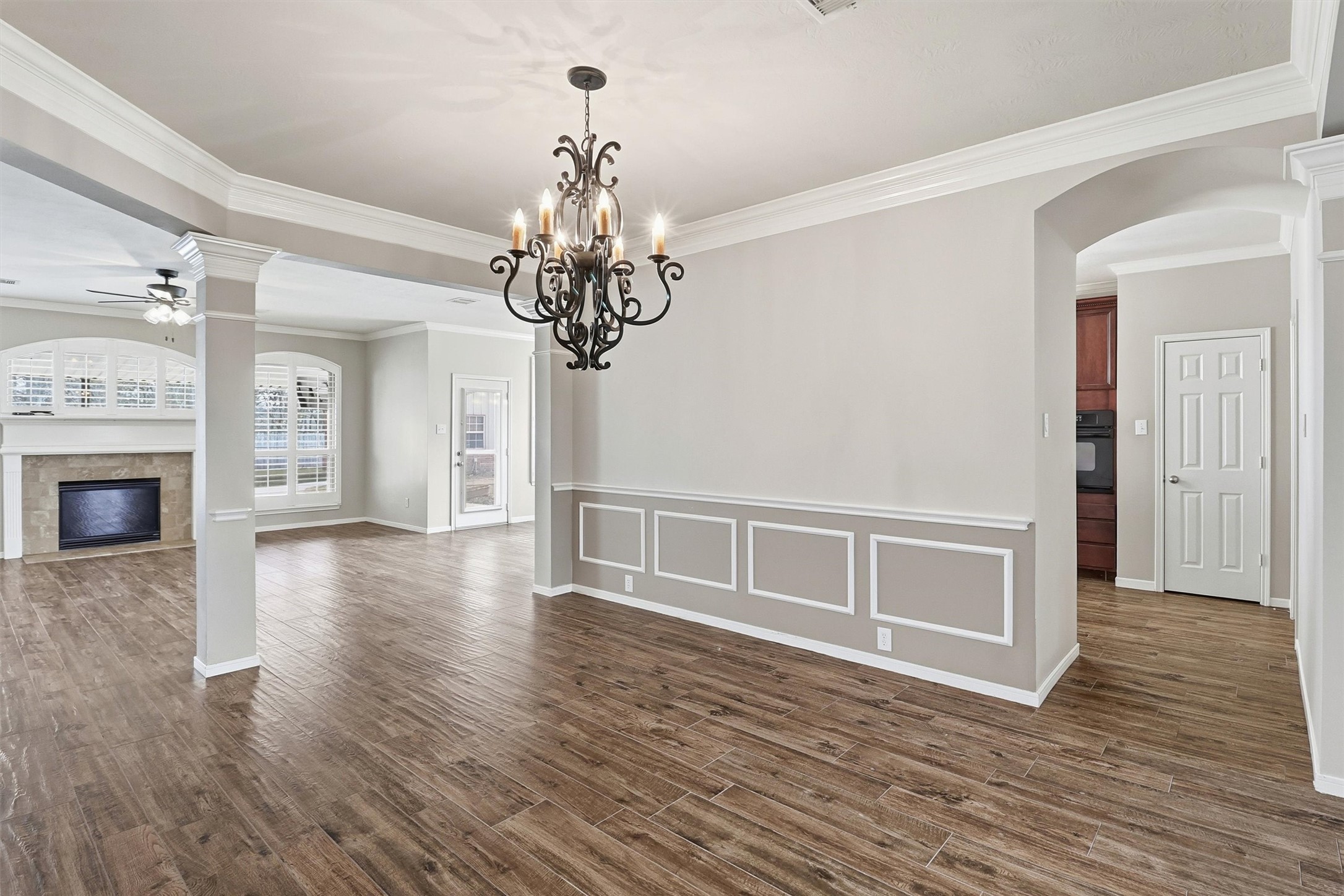 3602 River Bend Drive Rosenberg, TX 77471 - Photo 15 of 49 a view of a livingroom with wooden floor and a chandelier