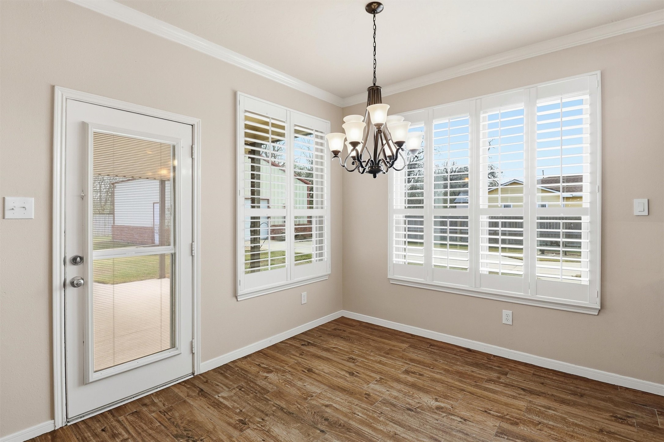 3602 River Bend Drive Rosenberg, TX 77471 - Photo 25 of 49 a view of an empty room with a window and wooden floor